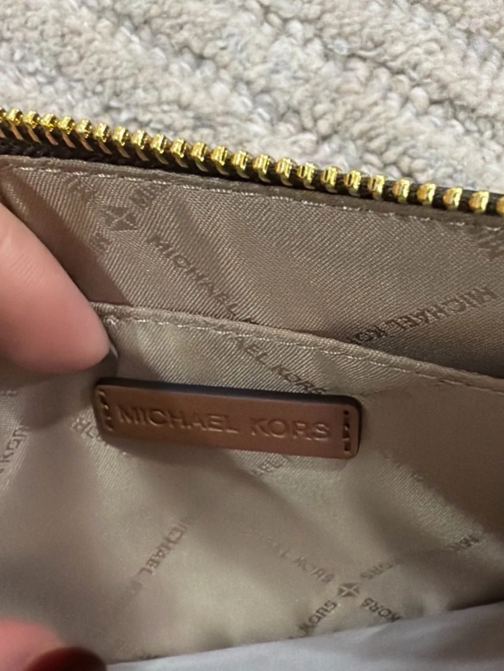 Michael Kors Brown and White MK Signature Stripe Wristlet